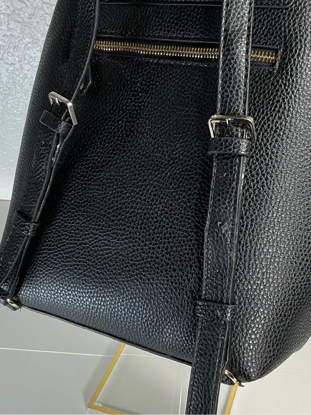 GUESS Black Pebbled Leather Drawstring Backpack with Gold Hardware